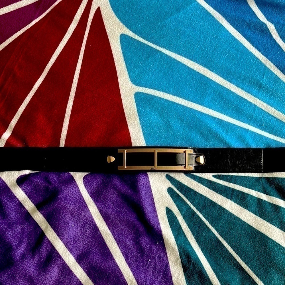 Bebe Brand New Black and Gold Belt w stretch 30 inches and stretches to 35-37ish